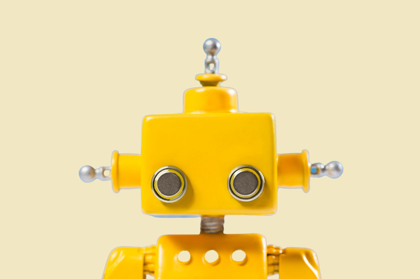 Yellow robot to represent ChatGPT and Google